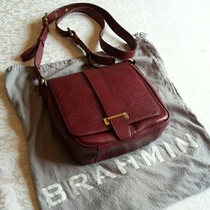 Brahman Authentic red crossbody and dust bag
